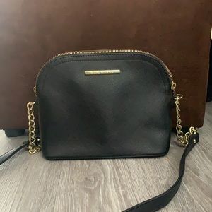 Crossbody Steve Madden purse.